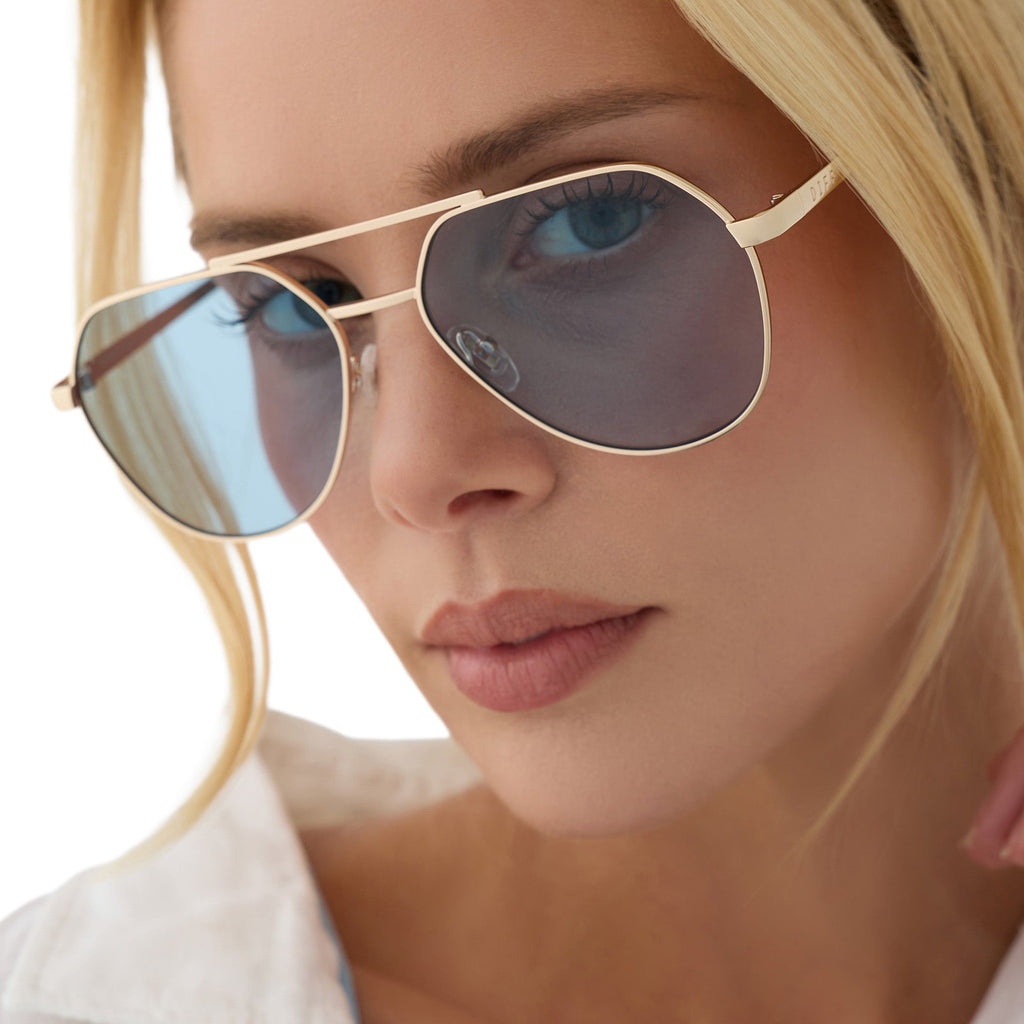 THE RESERVE - GOLD + BLUE TINT SUNGLASSES